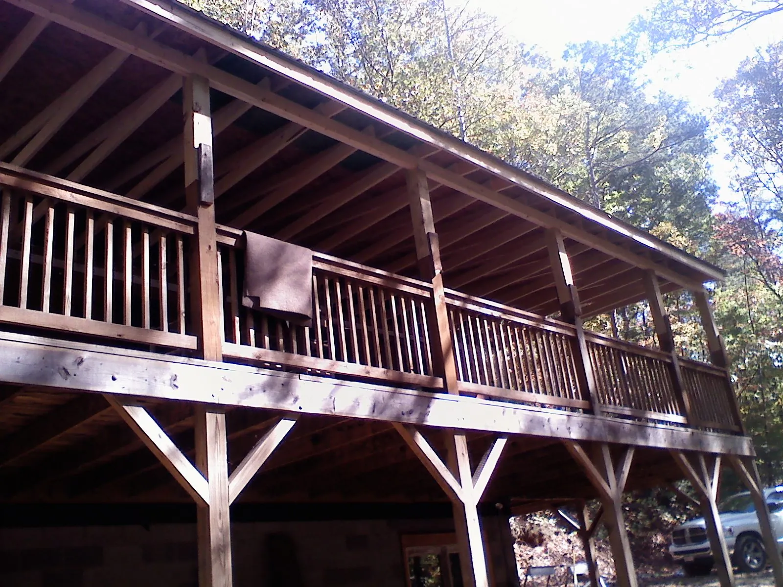 Timber framing under a new elevated porch and deck — Roof Leak Repair in Theresa by Roofing Brothers